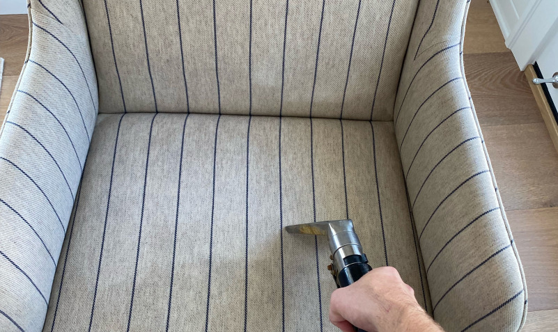 cleaning the chair with hot water extraction